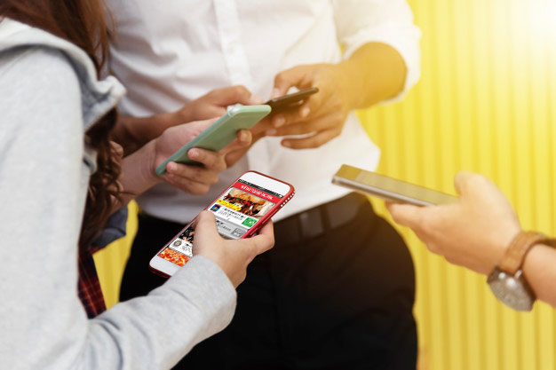 group of people with smartphones